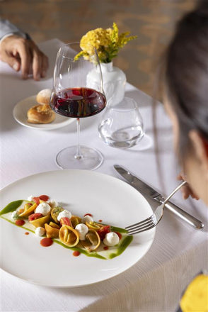 BETWEEN CELLAR AND KITCHEN